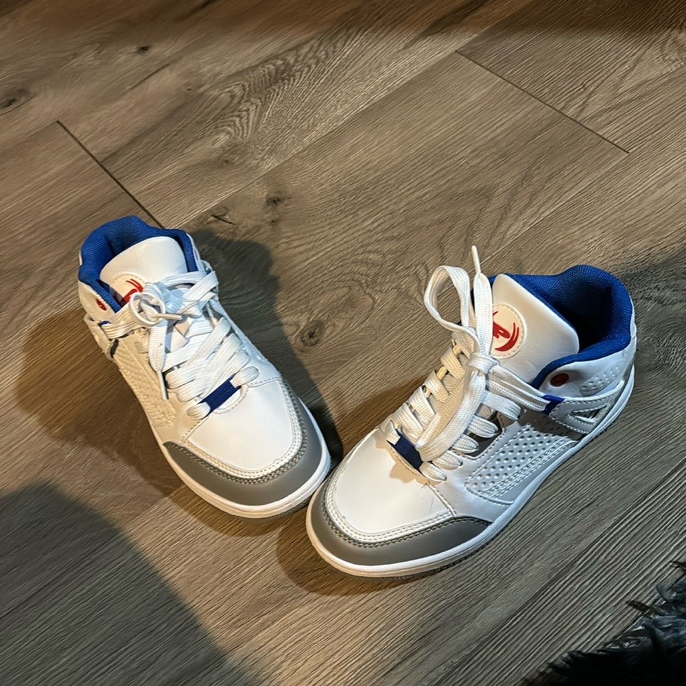 Youth boys high top shoes.